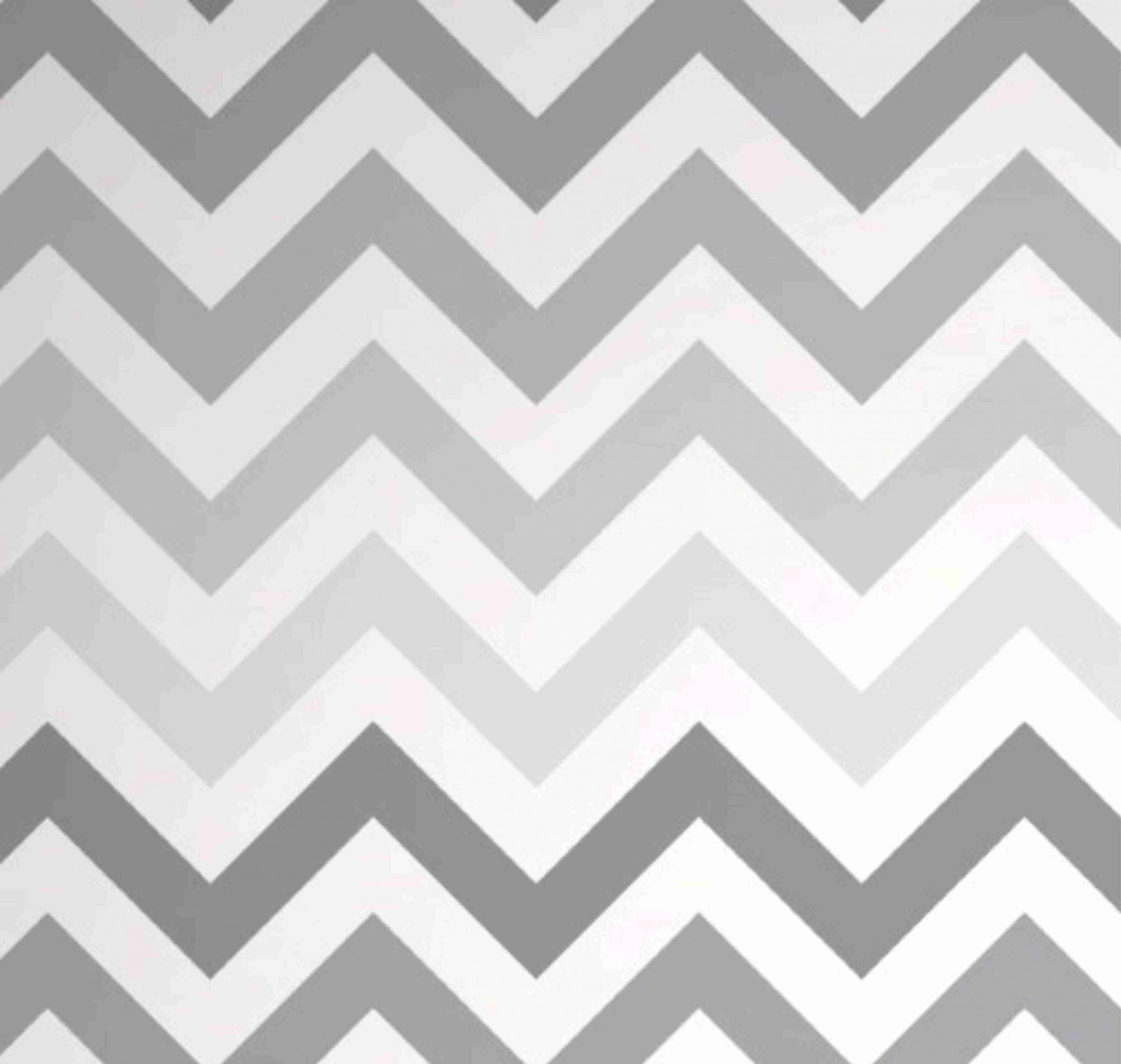 PAPEL DE PAREDE CHEVRON EM LISTRAS COM O FUNDO BRANCO E LISTRAS EM CINZA